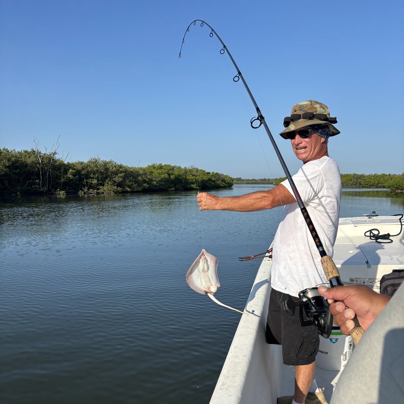 Portrait of the charter fishing captain for Tide & Line Charters in New Smyrna Beach, Florida